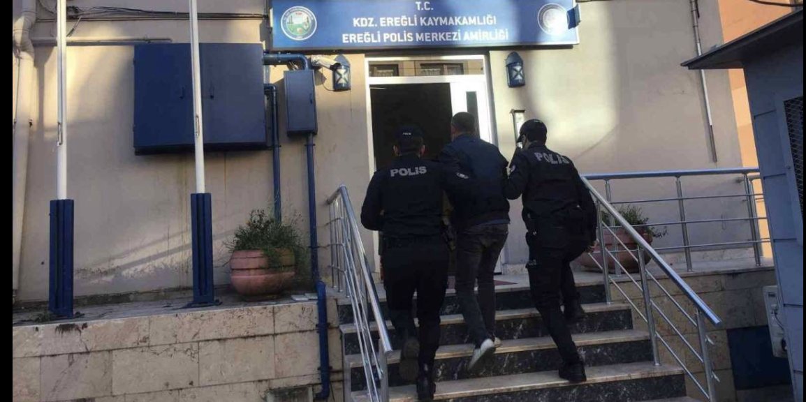 Erdoğan'ın fotoğrafını yere atan kişi tutuklandı
