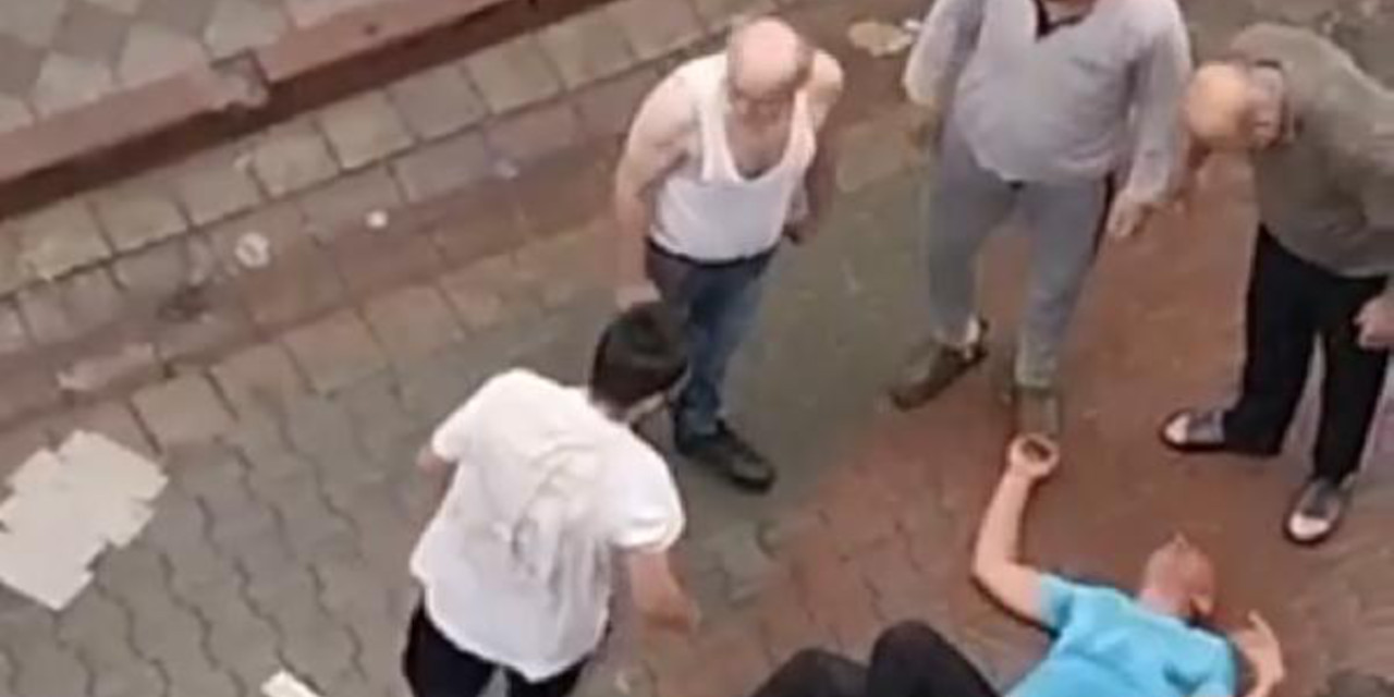 Soymaya çalıştığı minibüsün içinde mahsur kalan kişiye mahallede dayak