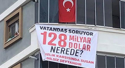 "128 milyar dolar nerede?" pankartını MHP'li Mutlu evine astı