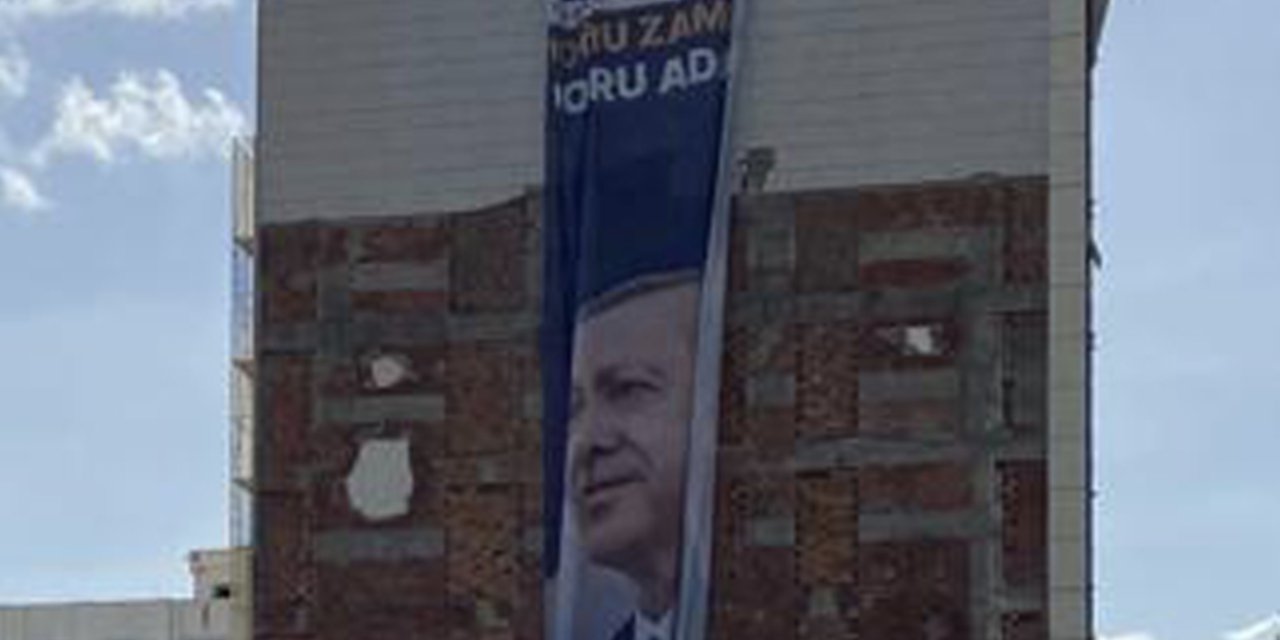 65 kişinin can verdiği İsias Otel'in karşısına Erdoğan’ın fotoğrafını asılmasına tepki