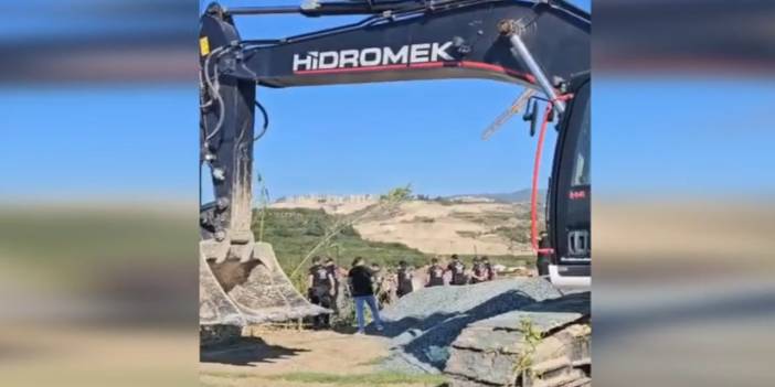 Kurtderesi'ne polis eşliğinde kepçe girdi