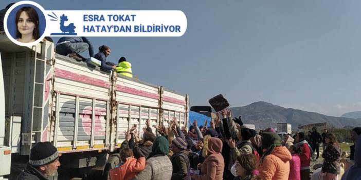 Depremzedeler yardım alabilmek için arabaların olduğu yerlere geliyor