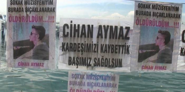 Sokak müzisyeni Cihan Aymaz'ın öldürüldüğü yere çiçek ve müzik aletleri bırakıldı
