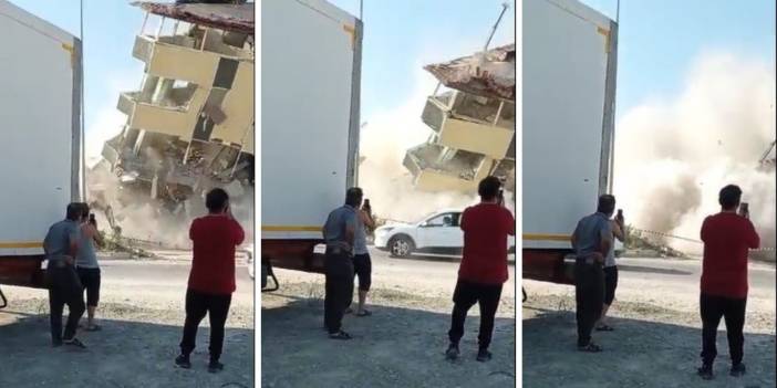 Hatay'da hasarlı bina yıkım sırasında yola devrildi